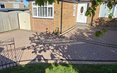 Bungalow block paving driveway faded and dirty before pressure washing