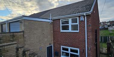 A roofline after the gutters and fascias were cleaned